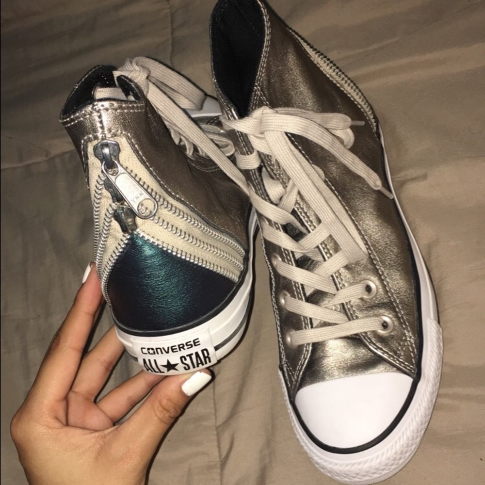 Darkish silver and navy blue on back Converse
