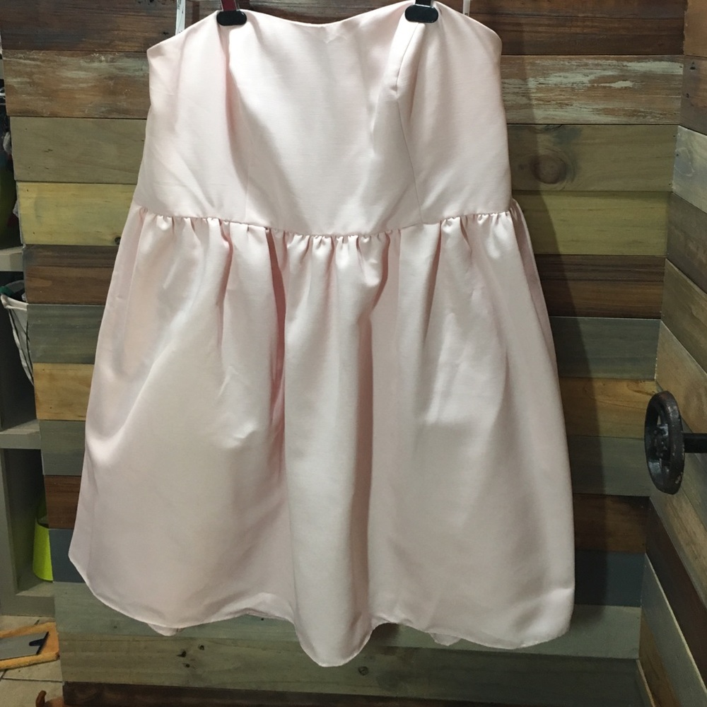 Strapless blush knee length dress