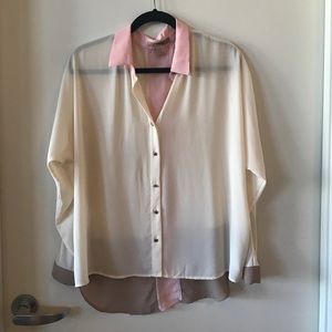 Collared cream blouse with gold buttons
