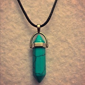 Blue/turquoise crystal on a black adjustable chain