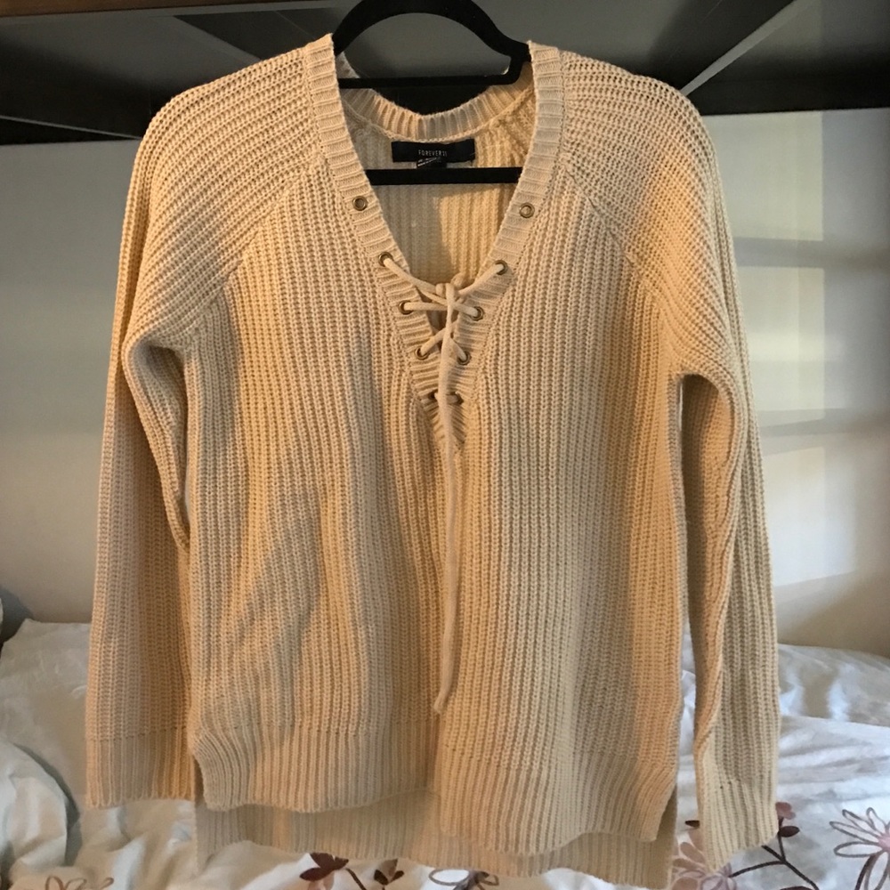 Beige knitted sweater