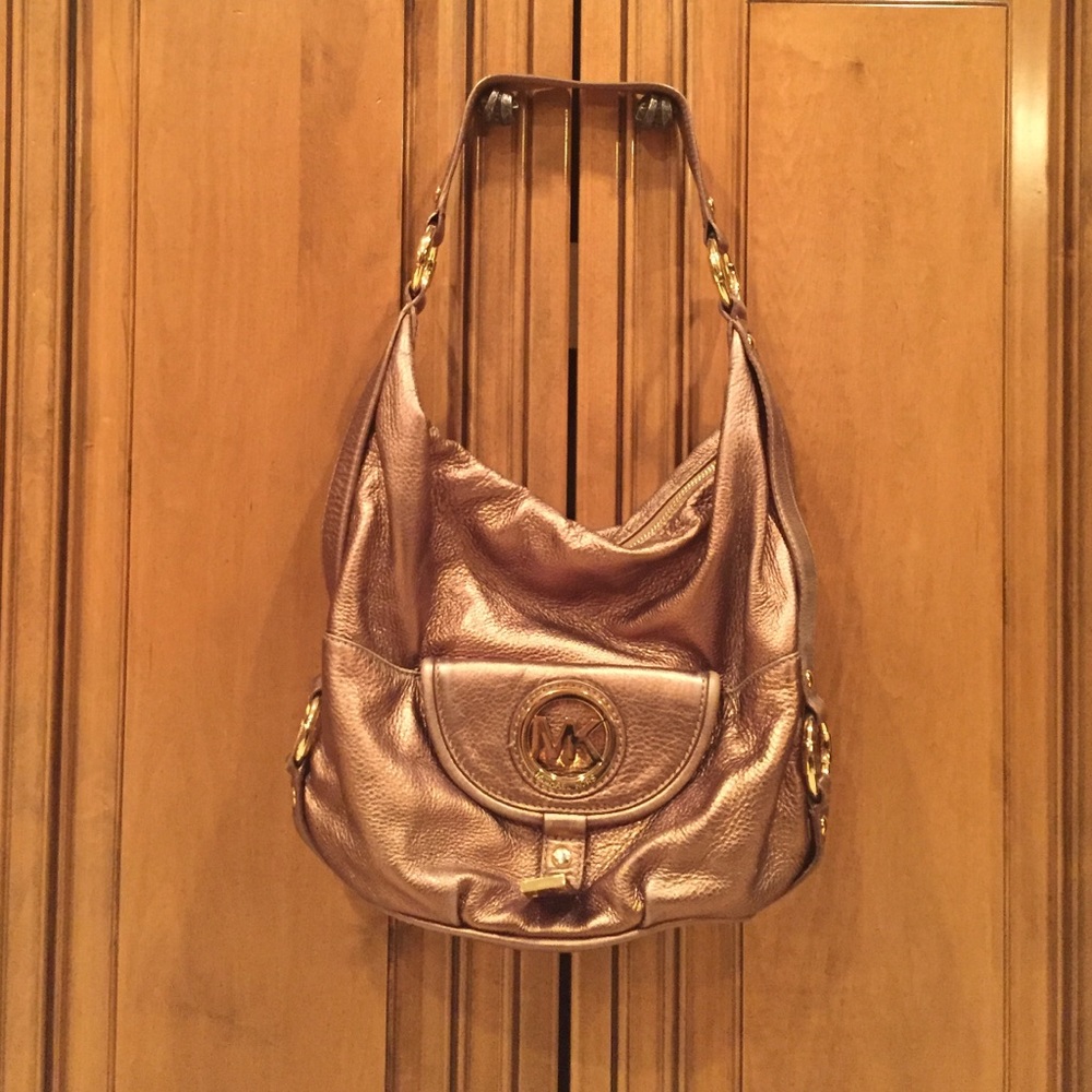 authentic MK bronze metallic hobo bag.