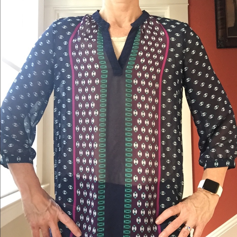 Cute sheer brightly patterned navy blouse