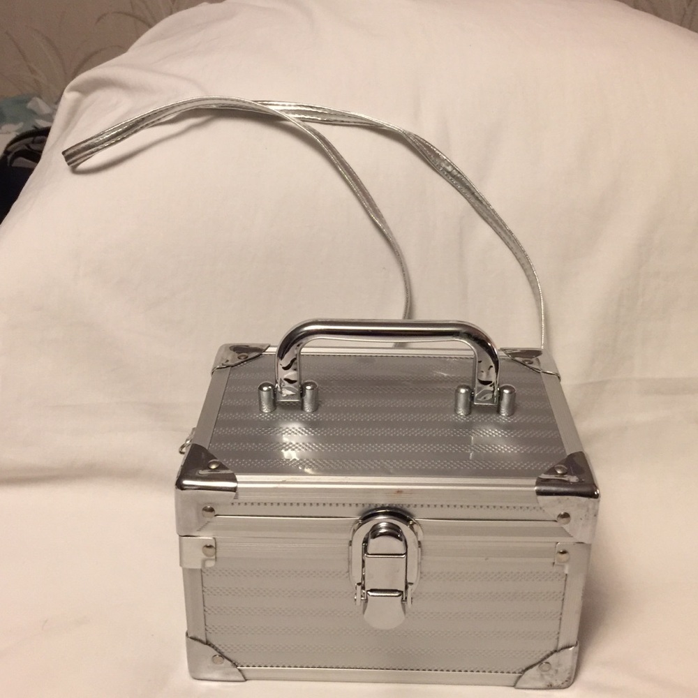 Far Nine silver cross body purse