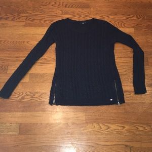 Stylish navy blue sweater with zippered sides