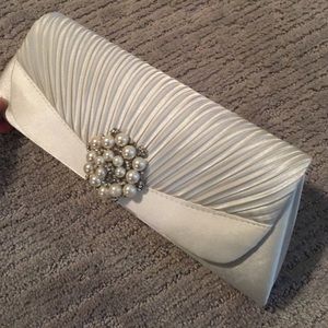 White clutch handbag