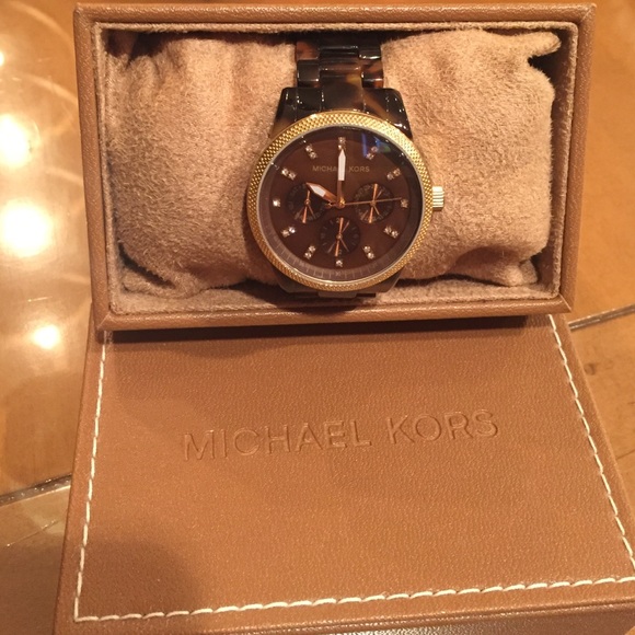 Michael Kors Accessories - MK tortoise watch. Comes with box and links!