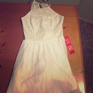 White and gold sparkle dress.