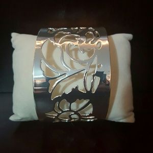 Silvertone floral cuff bracelet