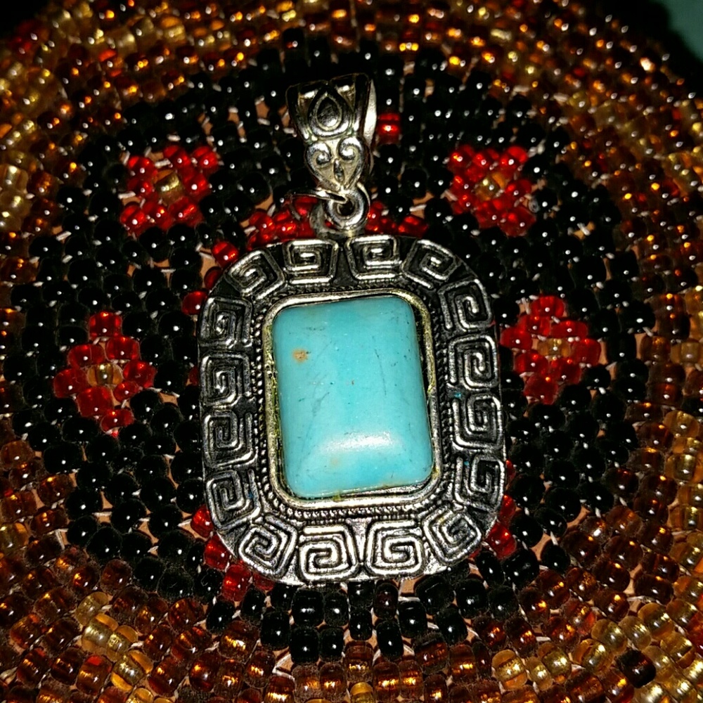 Turquoise and silver necklace pendant