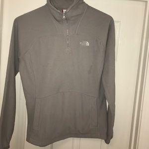 Grey North Face hooded pull over, size Medium.