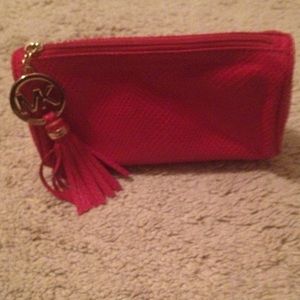 Michael Kors makeup bag. Red