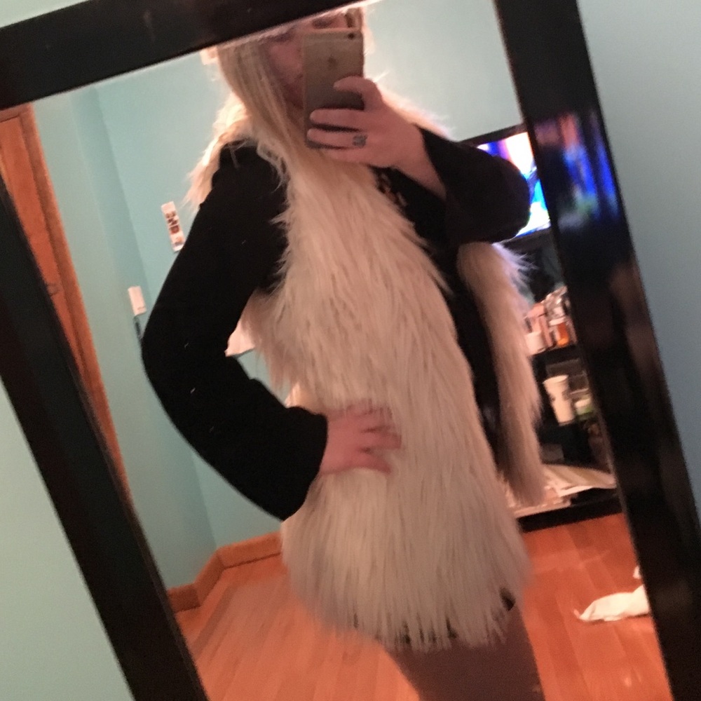 White fuzzy vest