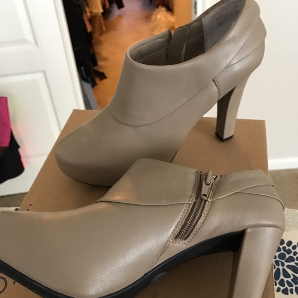 Brand new never been worn tan booties.