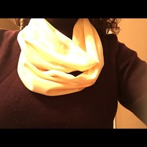Yellow infinity scarf.
