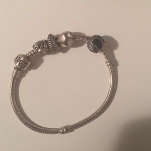 Pandora bracelet with four charms