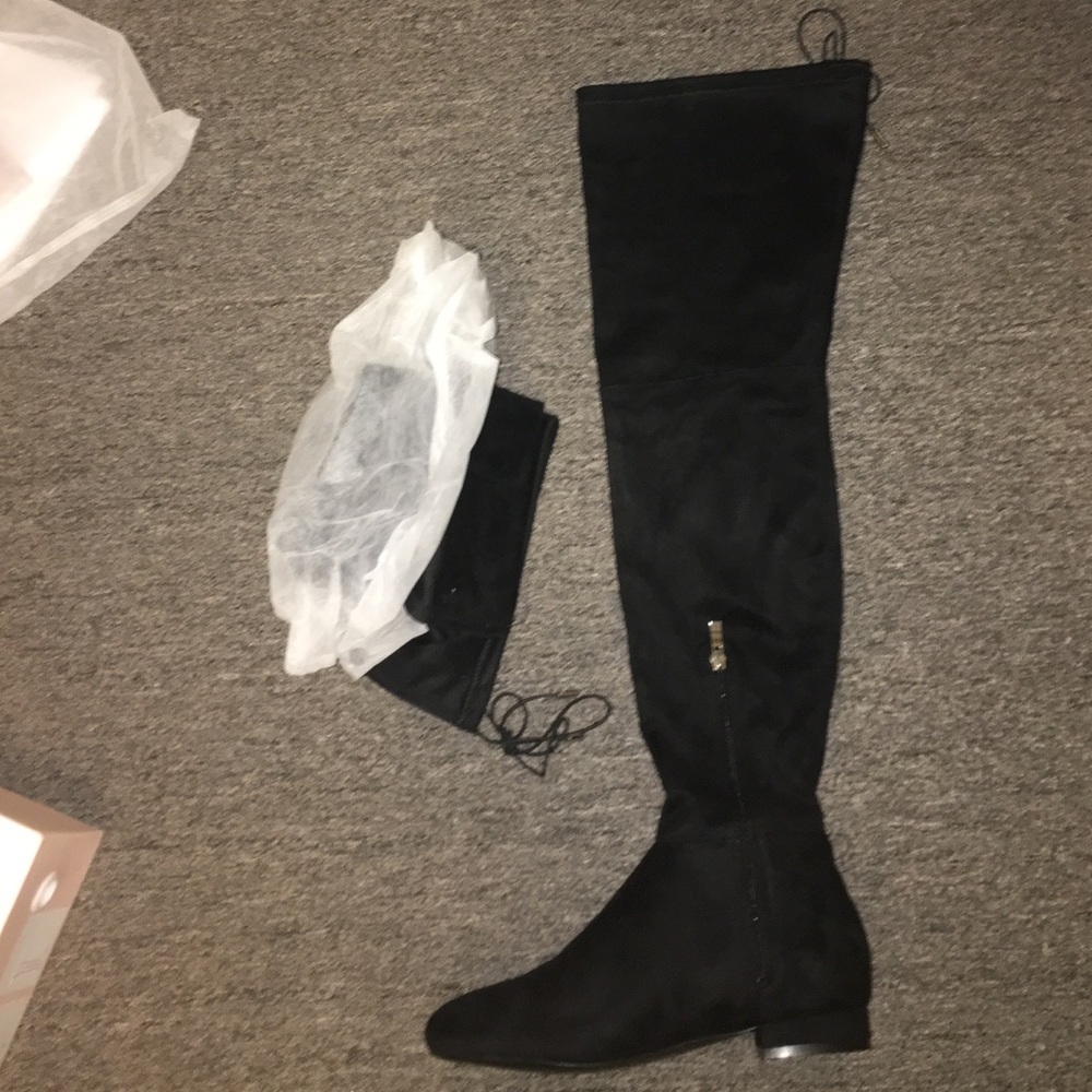 over the knee black suede boots.