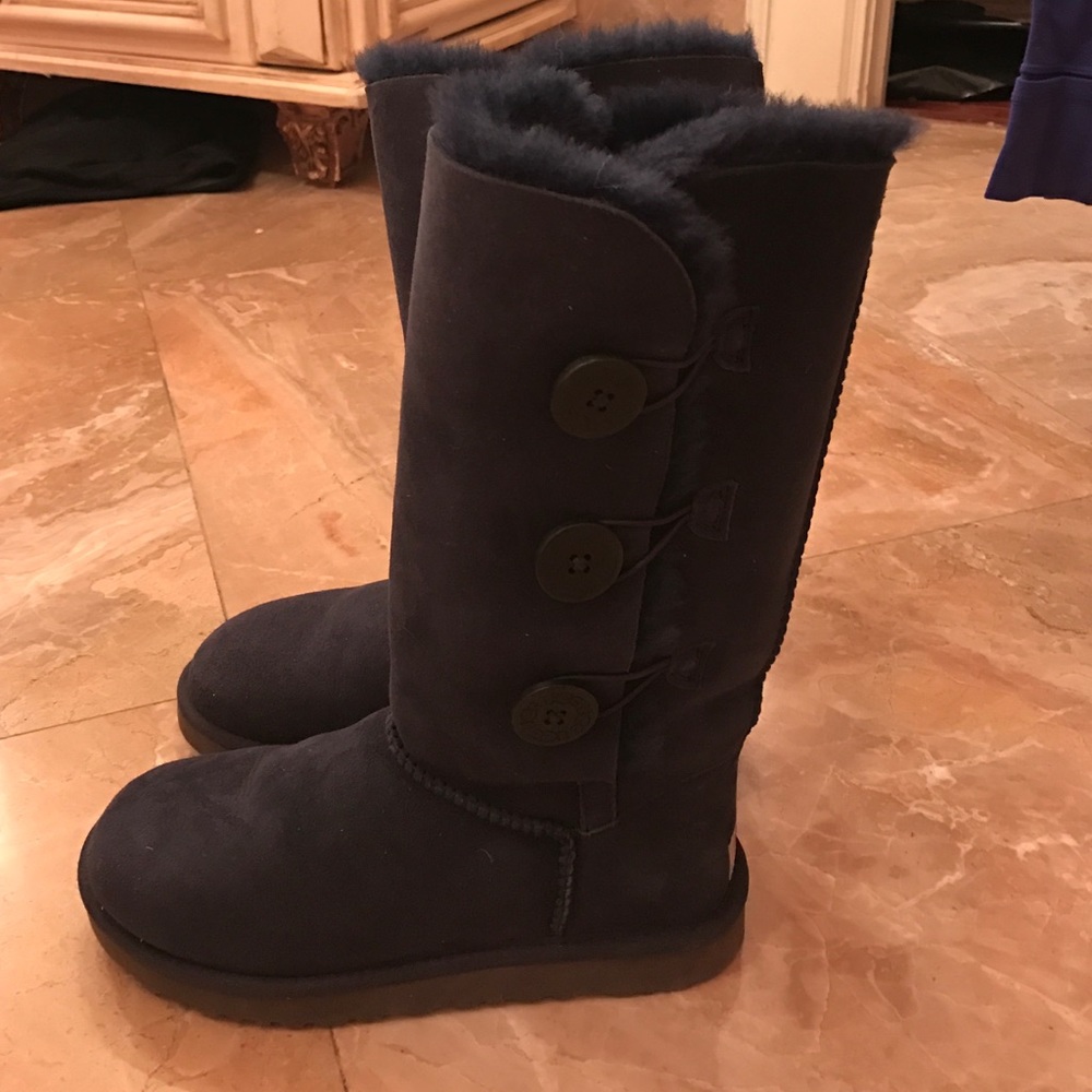 Tall dark navy button Uggs.