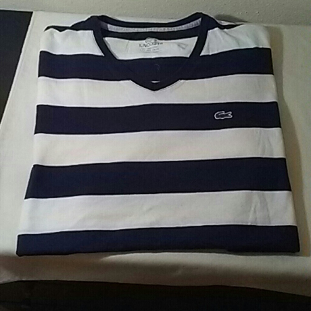 Lacoste short sleeve shirt.