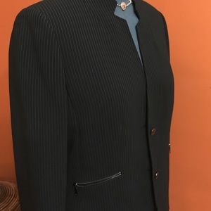 A Tahari Navy Blue Stripes Power Suit