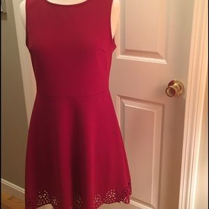 Skater dress with cutouts on the bottom Skater dress with cutouts on the bottom