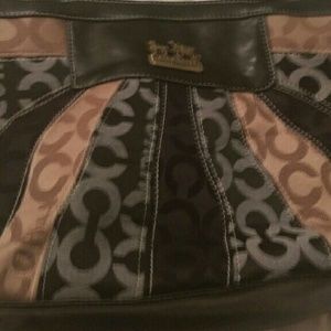 Black and tan coach purse