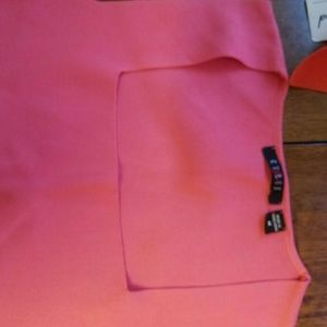 Peachy orange colored tank