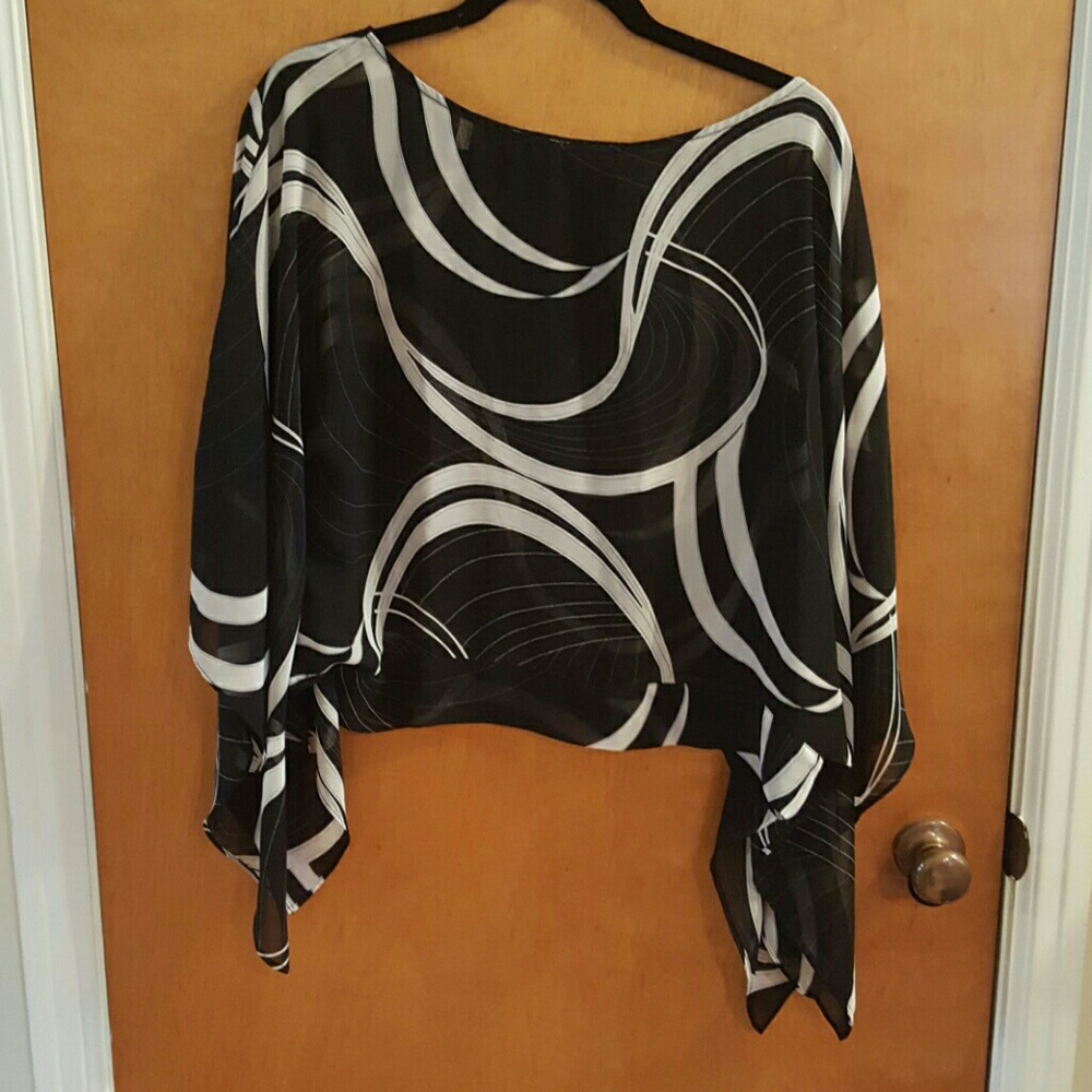 Sheer black and wide arms top