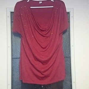 Tshirt material blouse with studs around collar