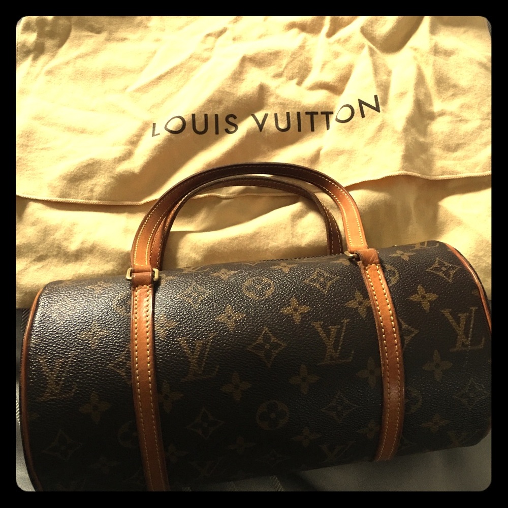Louis Vuitton logo canvas cylinder bag