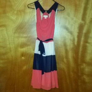 Beautiful coral, cream and navy striped dress.