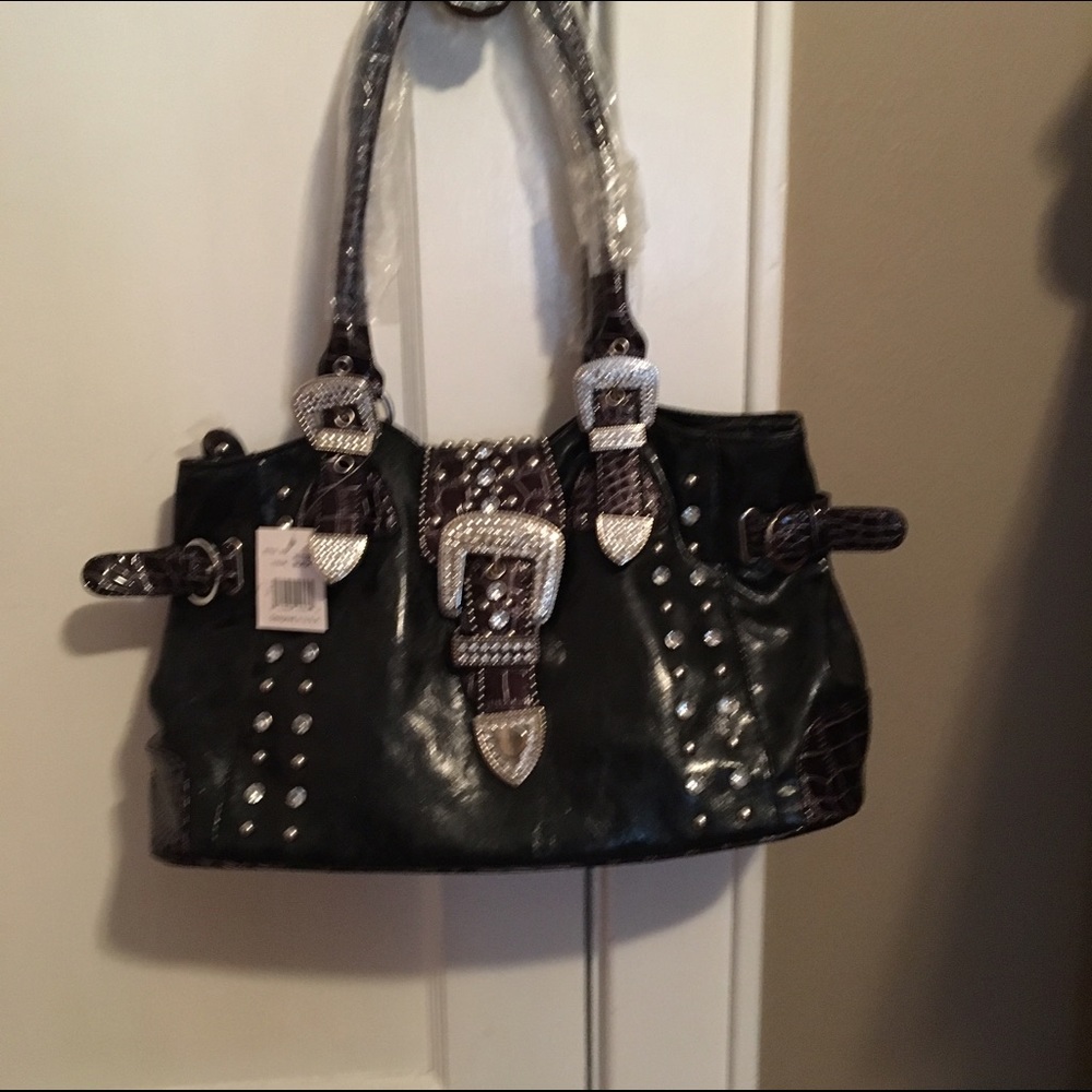 Large black purse w/ buckle & lots of bling.