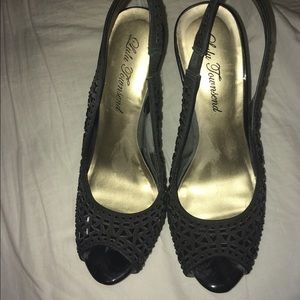 Black rhinestone pumps