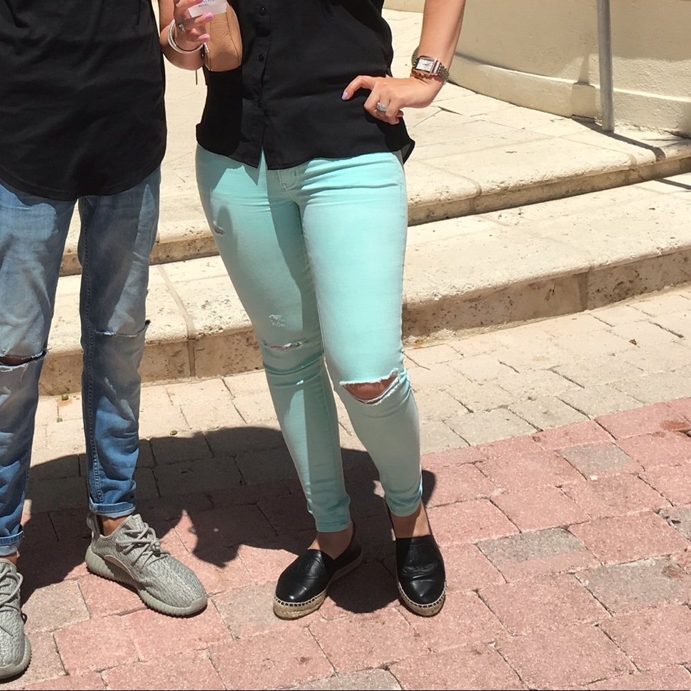 Light mint colored skinny jeans. Size 2