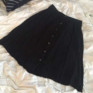Black mid length button down skirt