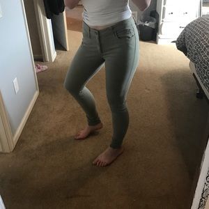 Green skinny pants