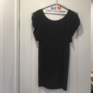 little black dress with puff sleeves