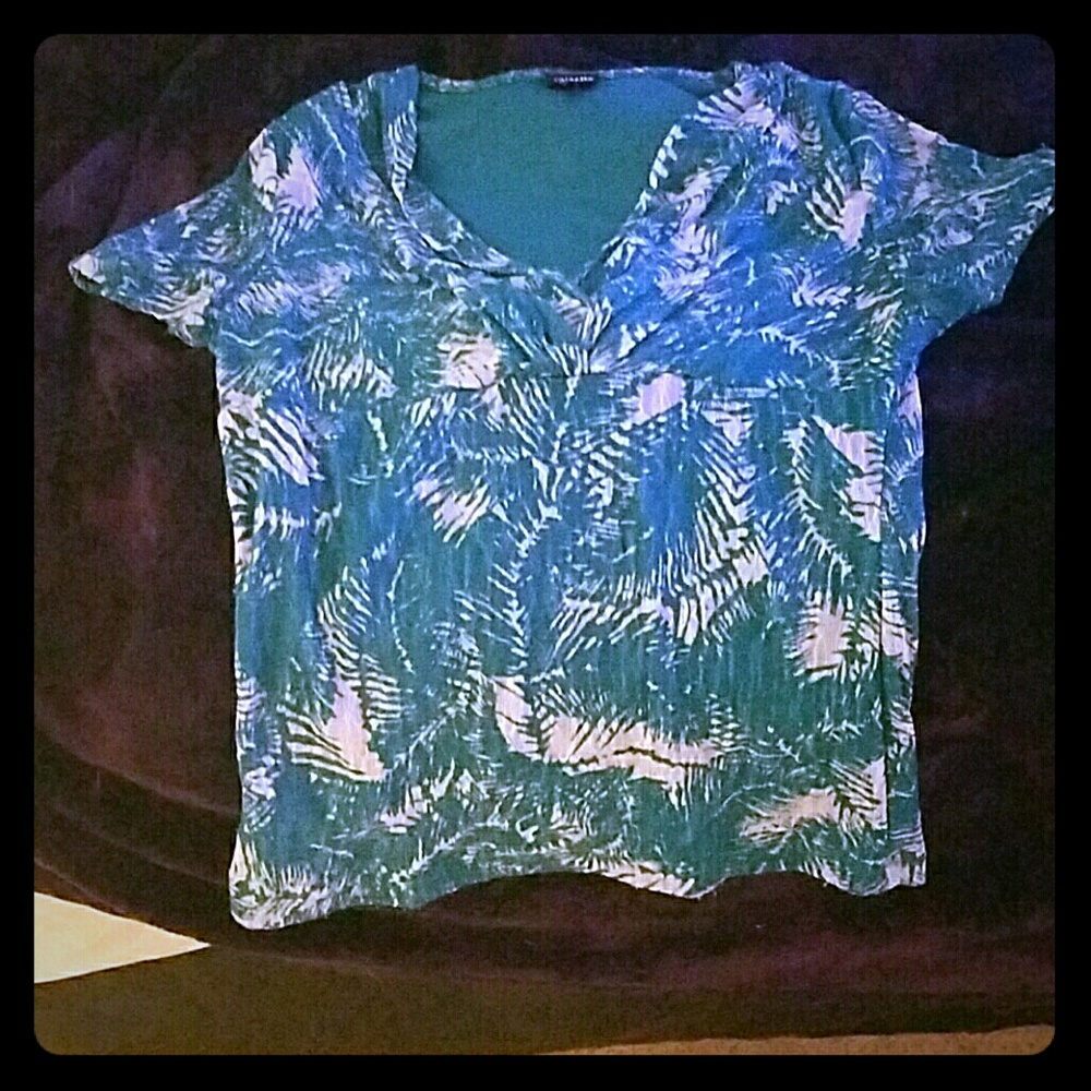 Dressy shirt not sure of material but very nice