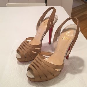 Beige louboutin high heeled shoes