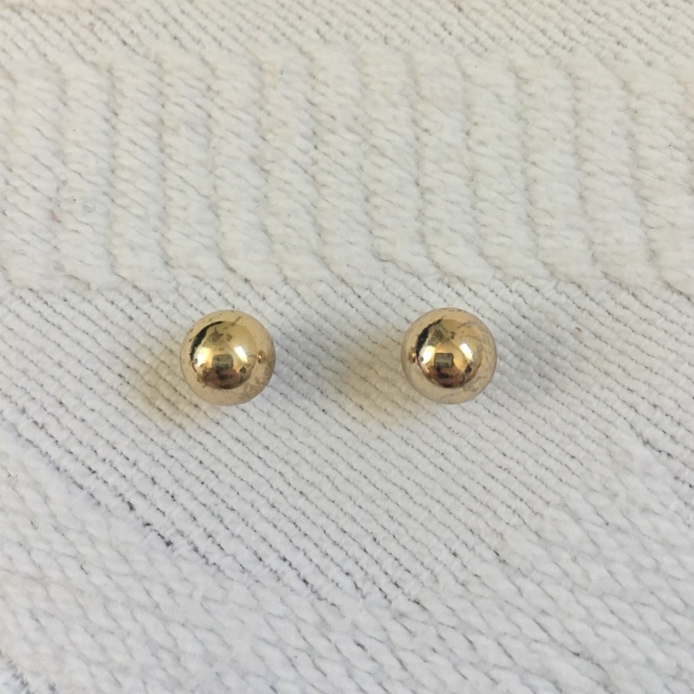 Gold stud earrings