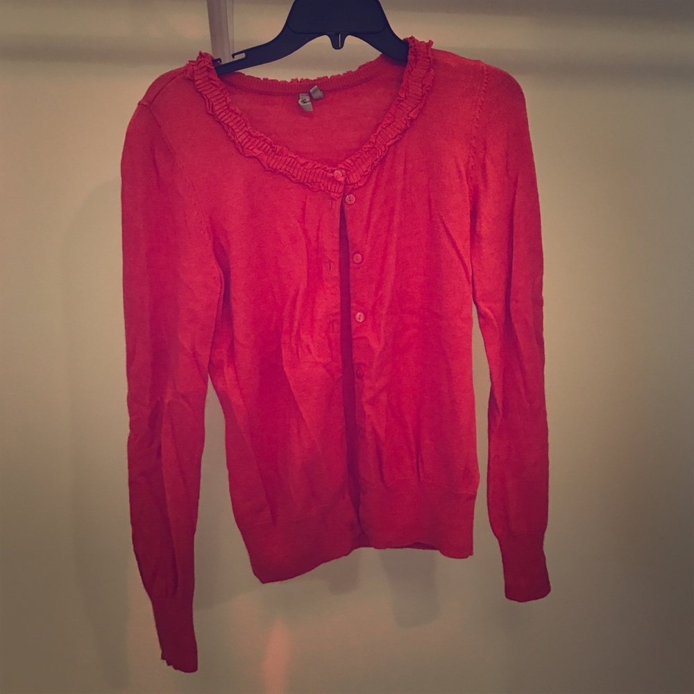 Carson burnt red knit sweater with ruffle detail