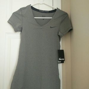 Grey Nike short sleeve top.