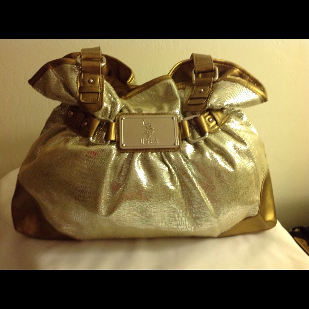 Two tone gold bucket bag.