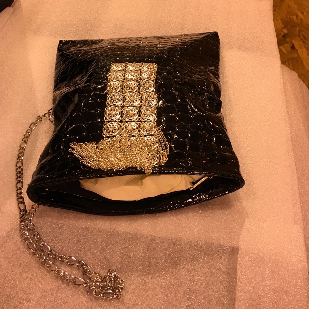 Elegant purse by White House/Black market. NEW.