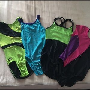 Four competition leotards