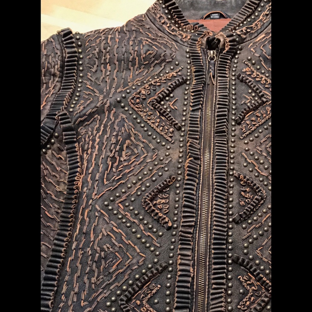 Embellished leather jacket.