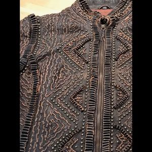 Embellished leather jacket.