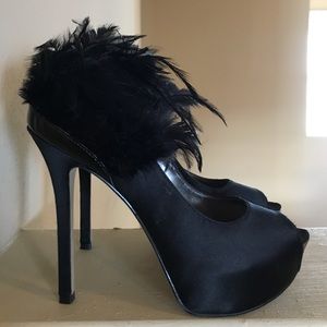 Black heels with feather detailing