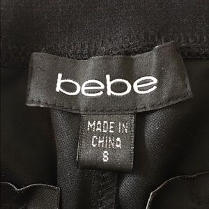 Bebe black faux leather pants