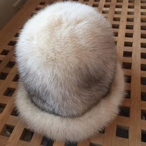 Fur hat. Not faux fur. Real fur, satin lining.